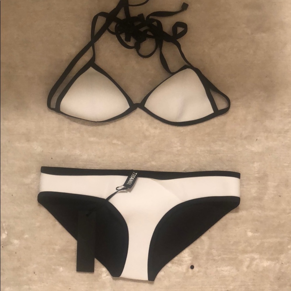New with tags XS White Triangl Bikini sold w/ bag